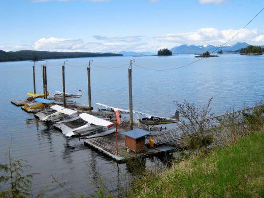 ketchikan-float plane dock_ketchikan.jpg - Never seen a “parking lot” for floatplanes?  The importance of floatplanes for getting around the Inside Passage is re-enforced by many  “parking lots” found on every shoreline.